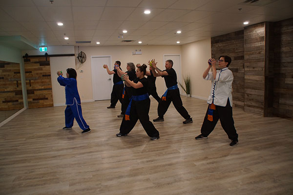 Plum Blossom Tai Chi Airdrie student attending the intermediate level class.
