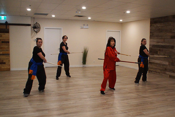 Plum Blossom Tai Chi Airdrie student attending the intermediate level class.